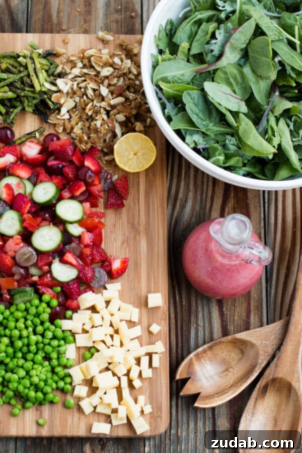 Gourmet Pomegranate Raspberry Salad A generous serving of the pomegranate raspberry salad, highlighting its rich colors and appetizing texture.