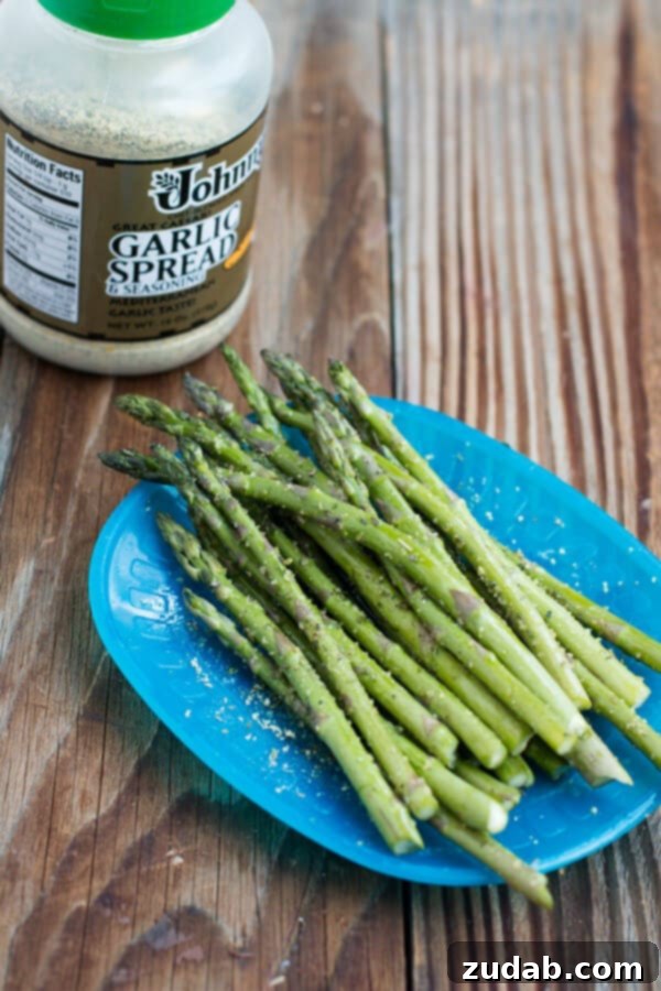 Pomegranate Raspberry Vinaigrette Salad 2 Perfectly grilled asparagus, seasoned to perfection, adds a savory touch to any gourmet salad.