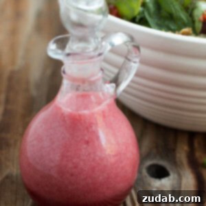 Pomegranate Raspberry Dressing Salad with vibrant ingredients