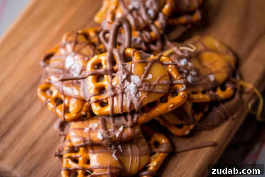 Homemade Salted Caramel Pretzel Snaps for the Holidays A wide shot of a platter filled with freshly made salted caramel pretzel snaps, ready for serving or sharing, against a cozy background.