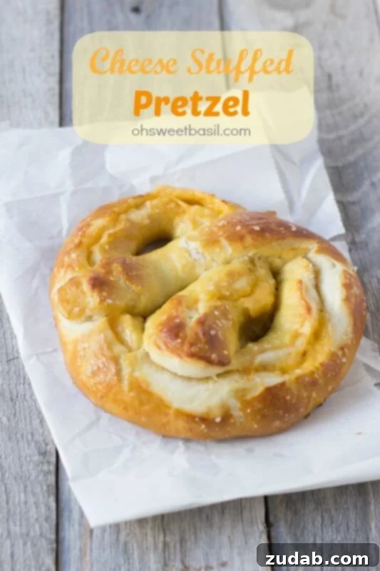 Golden Pretzels and Liquid Gold Cheese 3 The best soft pretzel recipe and it happens to be stuffed with melty cheese! ohsweetbasil.com