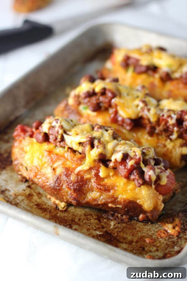 Golden Pretzels and Liquid Gold Cheese 4 Jalapeno and Cheddar Pretzel Hot Dog Buns with Turkey Chili Cheese