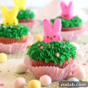 Delicious Cadbury Mini Egg Cupcakes 2 A finished Cadbury Mini Egg Cupcake with a bunny Peep on top.