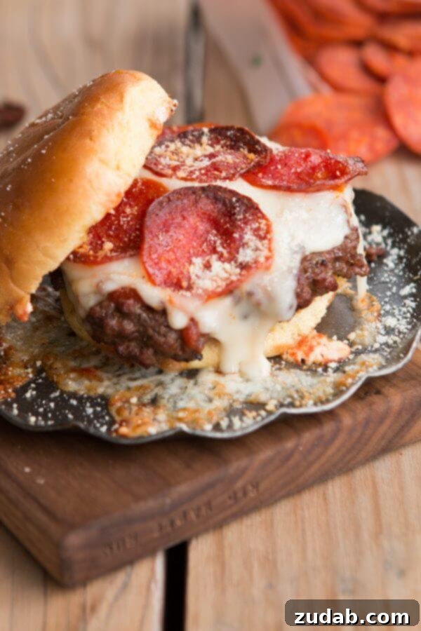 Enjoying a Homemade Pepperoni Pizza Burger Delicious Pepperoni Pizza Burger being served