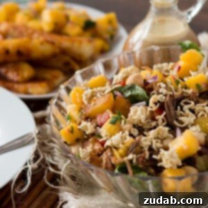 Crispy Island Pork Salad 2 Crunchy Polynesian Pork Salad, a delightful mix of savory pork, sweet mango salsa, and grilled pineapple.