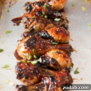 Zesty Orange Glazed Chicken Drumsticks 6 Sticky orange chicken drummies ohsweetbasil.com