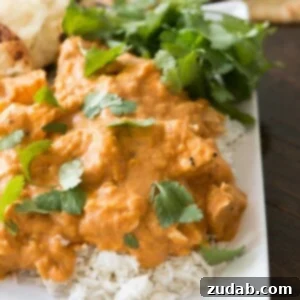 Creamy Coconut Chicken Curry 2 Close-up of a serving of Easy coconut chicken curry with a vibrant sauce and tender chicken pieces