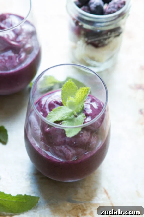 Delicious and healthy orange berry protein shake recipe to boost your day. Bright orange berry protein shake for a happier and healthier day, recipe by ohsweetbasil.com