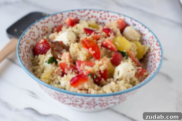 Cowboy Caviar Quinoa Recipe Video 6 A refreshing Berry Quinoa Salad featuring heirloom tomatoes, marinated mozzarella, and plump strawberries tossed with quinoa, ideal for a light summer meal without excess calories.