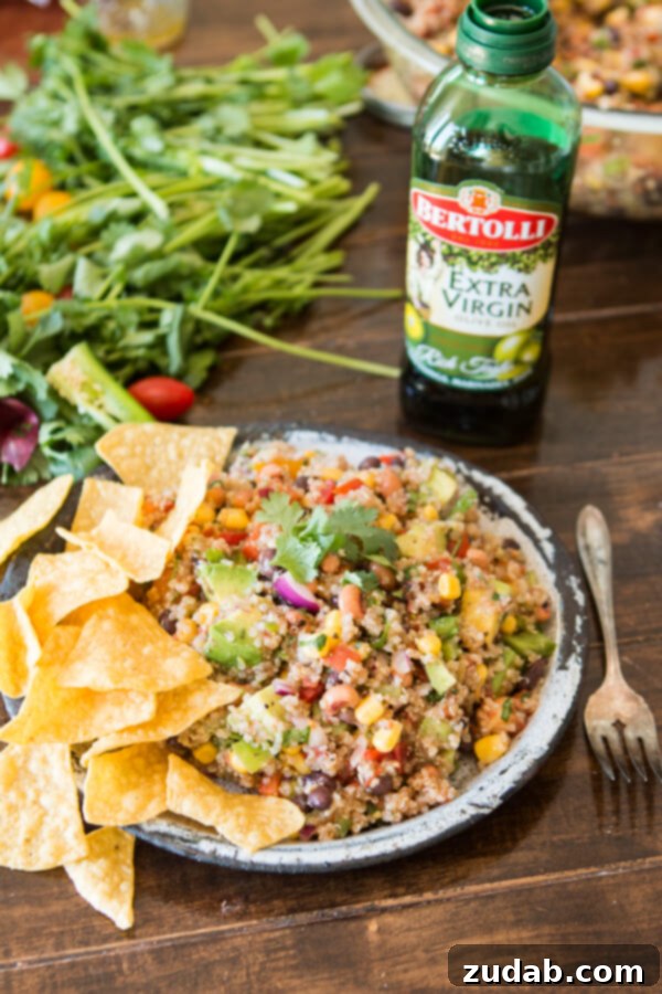 Delicious Cowboy Caviar Quinoa A close-up of the colorful and inviting Cowboy Caviar Quinoa salad in a serving bowl, showcasing its fresh ingredients and perfect for sharing.