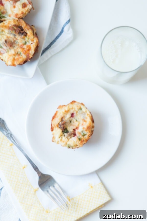 Delicious Eggs in a Nest: The Ultimate Family Breakfast Solution Savory eggs in a nest, a perfect protein-rich breakfast for the whole family, made with shredded potatoes in a muffin tin.
