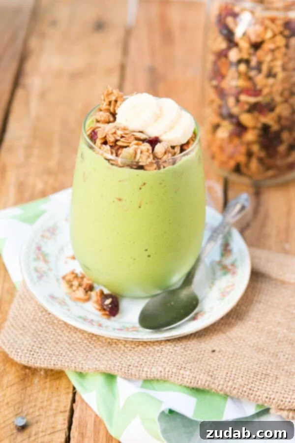 A Cozy Clutch 5 Refreshing protein green smoothie granola parfait, perfect for a quick and healthy start.