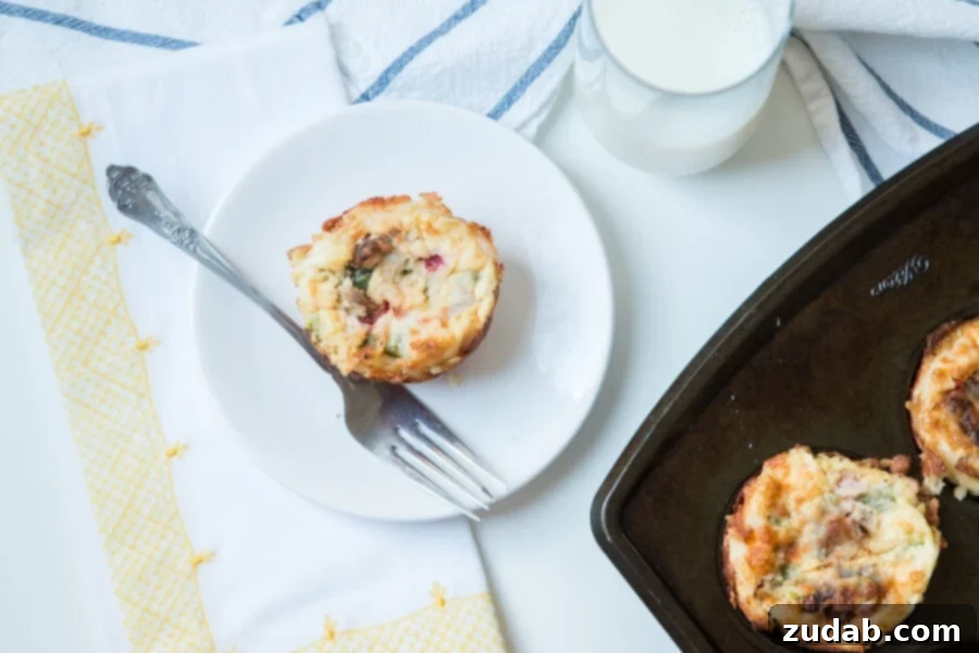 Eggs in a Nest: Simple and Wholesome Breakfast Recipe Savory eggs in a nest in a muffin tin, ready to be baked for a delicious breakfast.