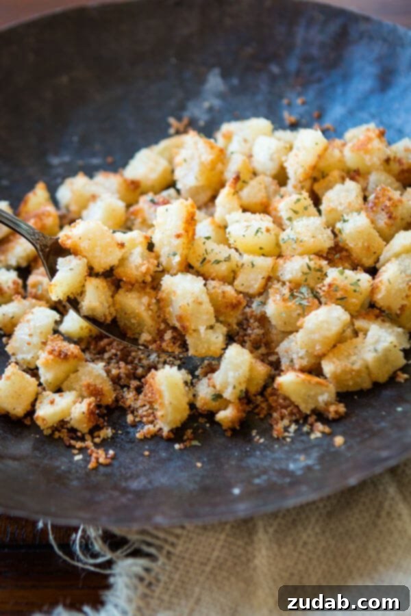 Crispy baked Shake N Bake Ranch Potatoes on a baking sheet. A baking sheet filled with perfectly golden and crispy Shake N Bake Ranch Potatoes, ready to serve.
