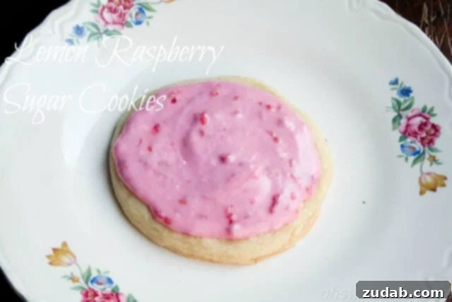 Irresistibly Soft Sugar Cookie Bars 5 Raspberry frosted lemon sugar cookies, a vibrant and delicious treat.