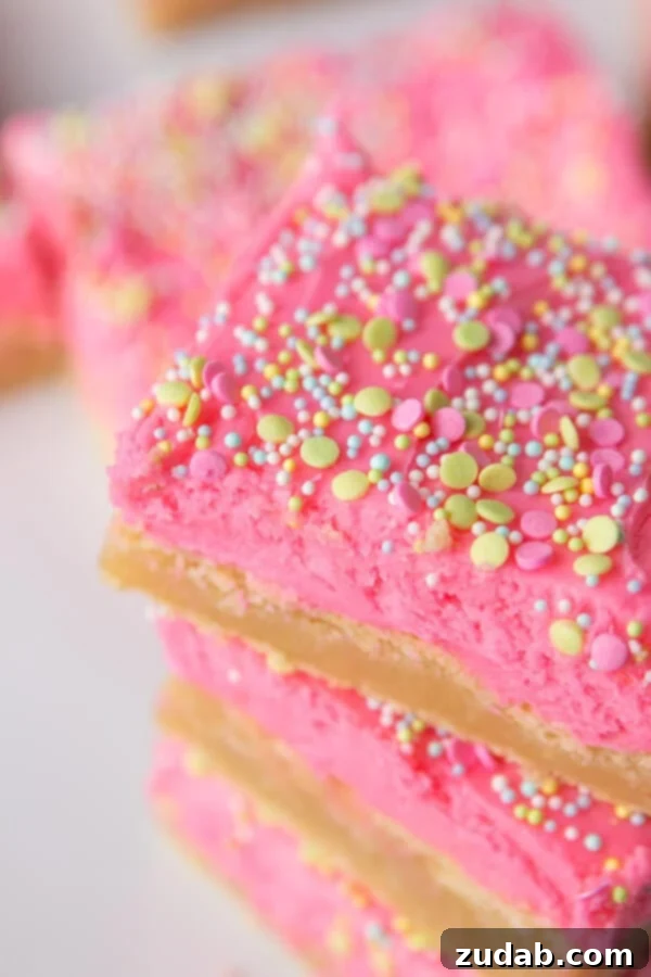 Delicious Soft Sugar Cookie Bars with a Creamy Frosting Bright and colorful sugar cookie bars, a delightful treat for celebrations.