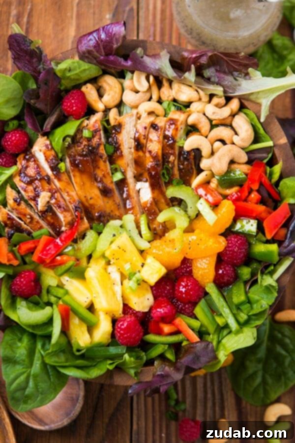 Easy Teriyaki Chicken Salad: Juicy Chicken, Veggies, Fruit & Cashews A vibrant Easy Teriyaki Chicken Salad, featuring juicy teriyaki chicken, mixed greens, colorful vegetables, sweet fruits, and crunchy cashews. Perfect for summer gatherings or a healthy meal.