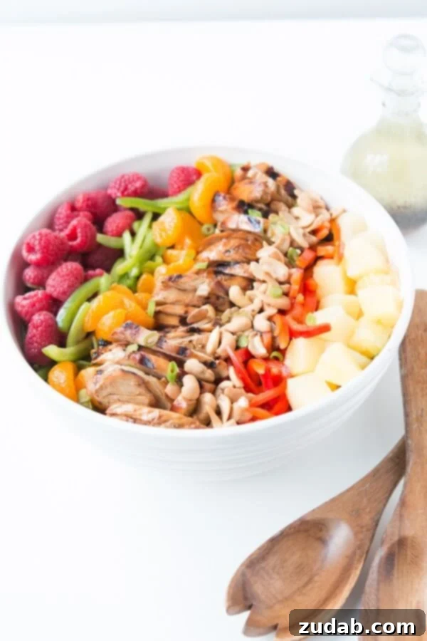 Easy Teriyaki Chicken Salad: Juicy Chicken, Veggies, Fruit & Cashews A refreshing Easy Teriyaki Chicken Salad, featuring tender teriyaki chicken, crisp greens, vibrant fruits, and crunchy cashews, perfect for any summer meal.