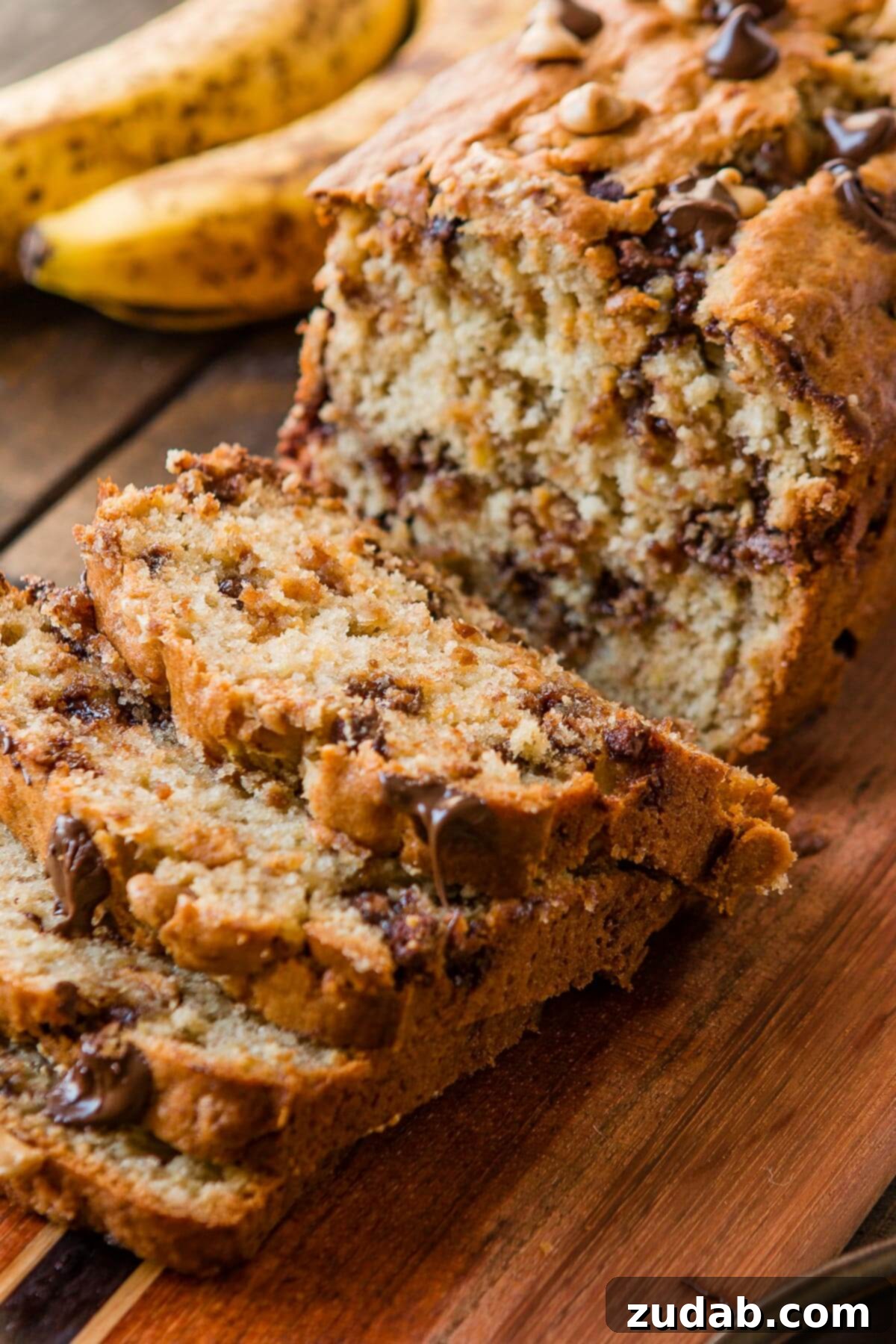 Ultimate Biscoff Banana Bread 9 Indulgent Peanut Butter Banana Bread from ohsweetbasil.com, showcasing a rich, moist texture with nutty swirls, perfect for any time of day.