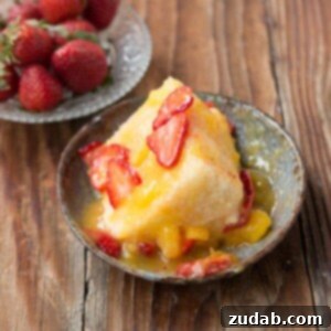Tropical Mango Angel Food Cake 2 A really light and craveable dessert, angel food cake with fresh mango sauce