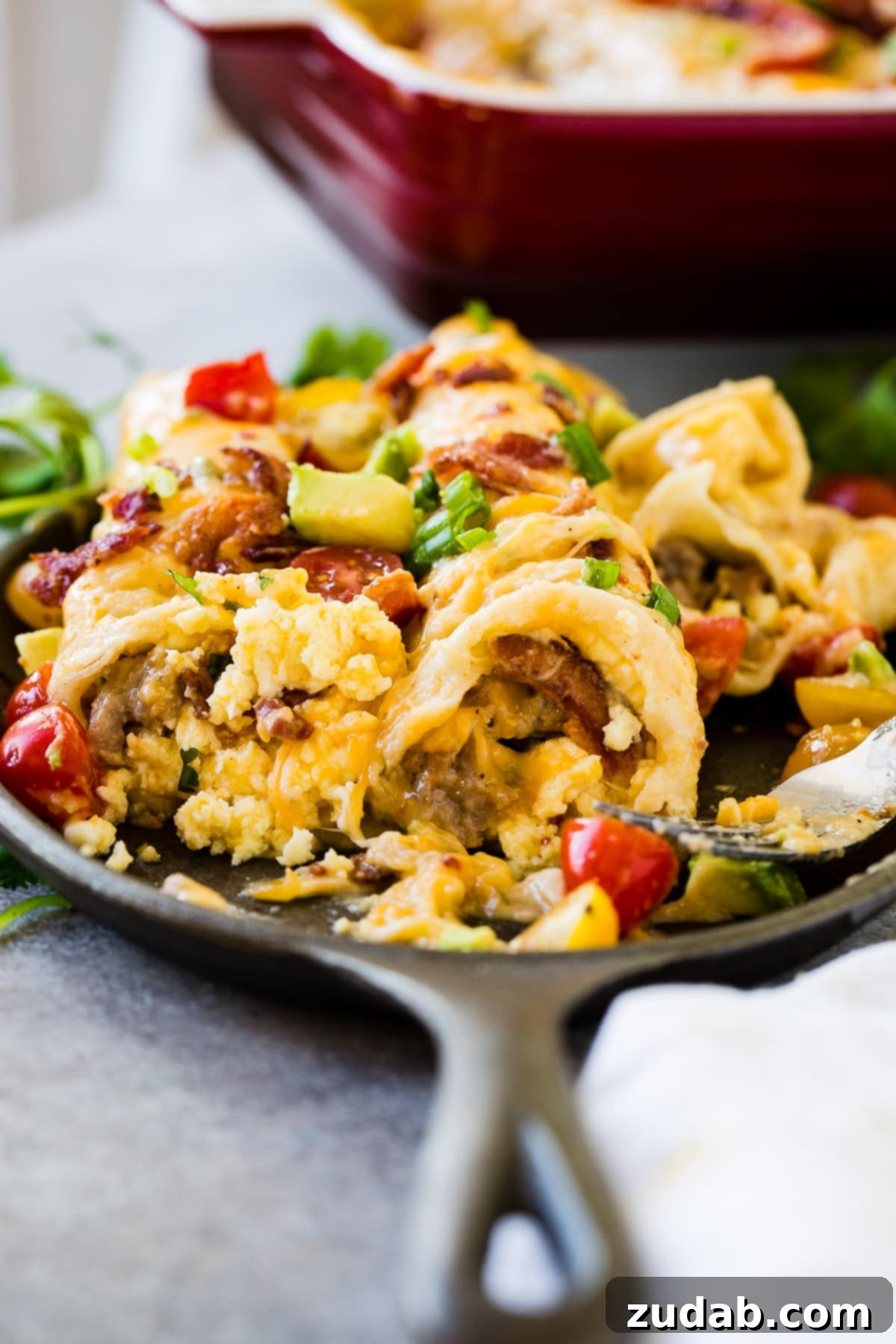 Salsa Verde Sausage and Cheese Breakfast Enchilada Bake 7 Cheesy egg and sausage breakfast enchiladas casserole to feed a crowd ohsweetbasil.com