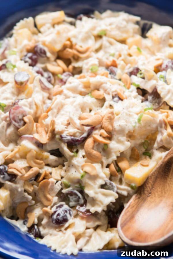 Bowtie chicken pasta salad is perfect for a BBQ. Creamy dressing, juicy pineapple and grapes, crunchy cashews and lots of chicken! Bowtie chicken pasta salad is perfect for a BBQ. Creamy dressing, juicy pineapple and grapes, crunchy cashews and lots of chicken!
