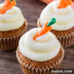 If you love carrot cake - then you definitely need to try these carrot cake cupcakes with cream cheese frosting. They're moist, have a delicate cupcake crumb, and lots of delicious frosting.