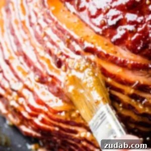 Garlic Honey Mustard Glazed Ham 5 A vibrant close-up of the Garlic Honey Mustard Ham, showing the rich, golden glaze and succulent texture, perfect for a holiday feast.