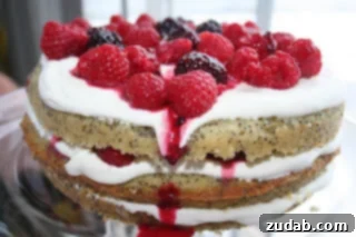 Delicious Berry Crème Fraîche Cake slices with fresh berries