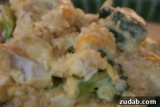Close-up of a serving of creamy Chicken Curry Casserole with tender chicken and broccoli