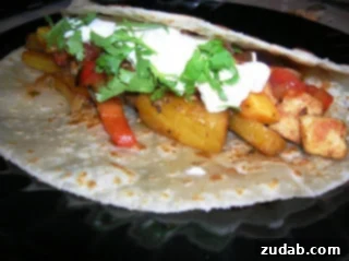 Sweet and Savory Pineapple Fajitas 2 Delicious Pineapple Fajitas with chicken, peppers, and mango salsa