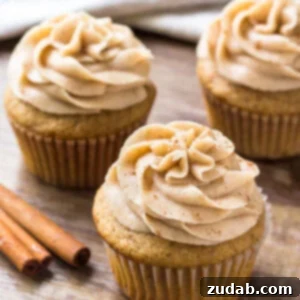 Fragrant Spice Cupcakes with Zesty Cinnamon Cream Cheese Frosting 7 Three spice cake cupcakes topped with cinnamon cream cheese buttercream, a perfect fall treat.