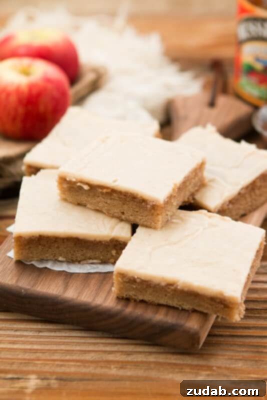 Fragrant Spice Cupcakes with Zesty Cinnamon Cream Cheese Frosting 9 A stunning apple butter spice sheet cake with a rich brown butter apple frosting, promising an incredibly delicious dessert experience.