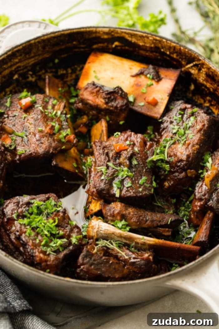Melt-in-Your-Mouth Oven Braised Short Ribs 3 a le creuset dutch oven full of one pot braised beef short ribs