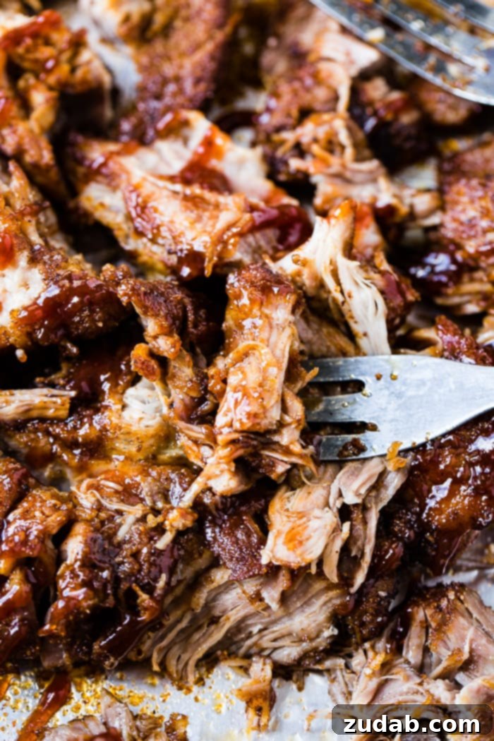 Perfect Instant Pot Country Style Ribs 2 Barbecue-coated shredded country style ribs with crisp edges and a deep, smoky finish.