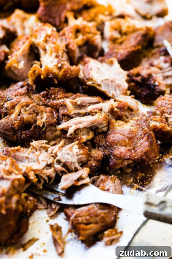 Perfect Instant Pot Country Style Ribs 3 A savory pile of pulled pork with homemade barbecue sauce clinging to every bite.