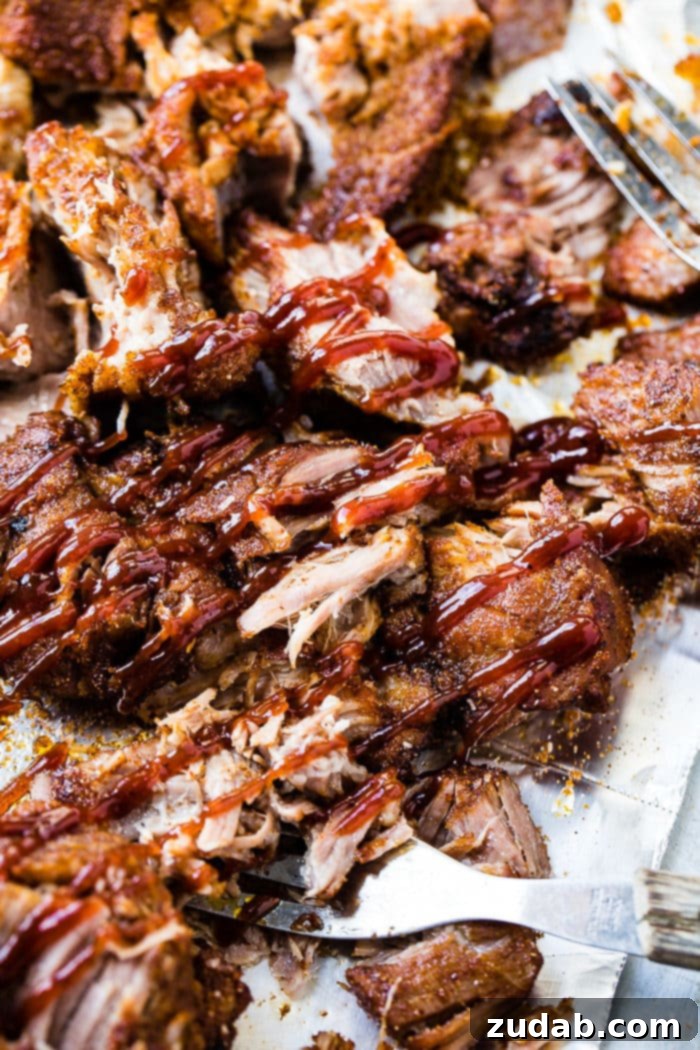 Perfect Instant Pot Country Style Ribs 5 A photo of rib meat smothered in homemade BBQ sauce.