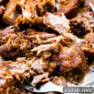 Perfect Instant Pot Country Style Ribs 7 A photo of shredded country style ribs covered in homemade BBQ sauce.