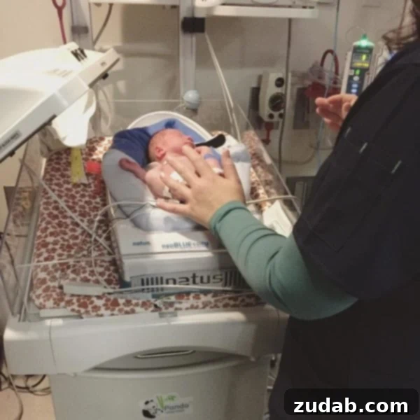The Twenty-Fifth Hour: Faith's Stand Against the Void 4 A photo of our son in his little NICU bed with a nurse touching his feet.