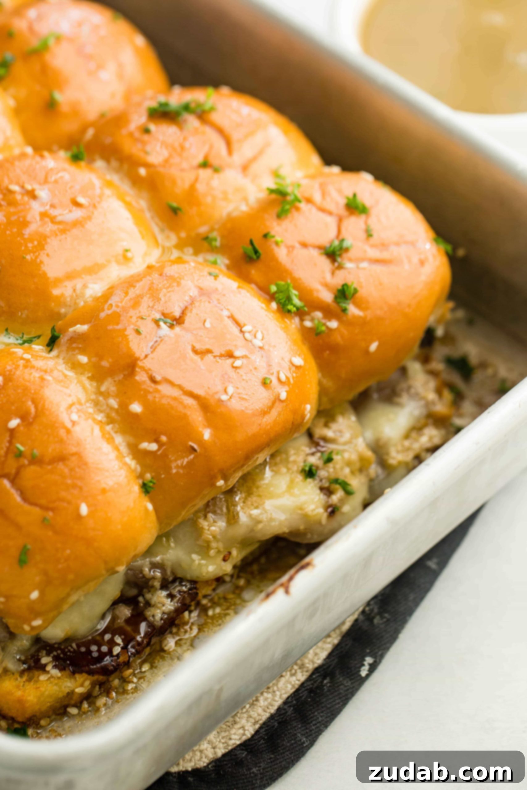 French Dip Sliders A photo of a pan full of perfectly baked french dip sliders.
