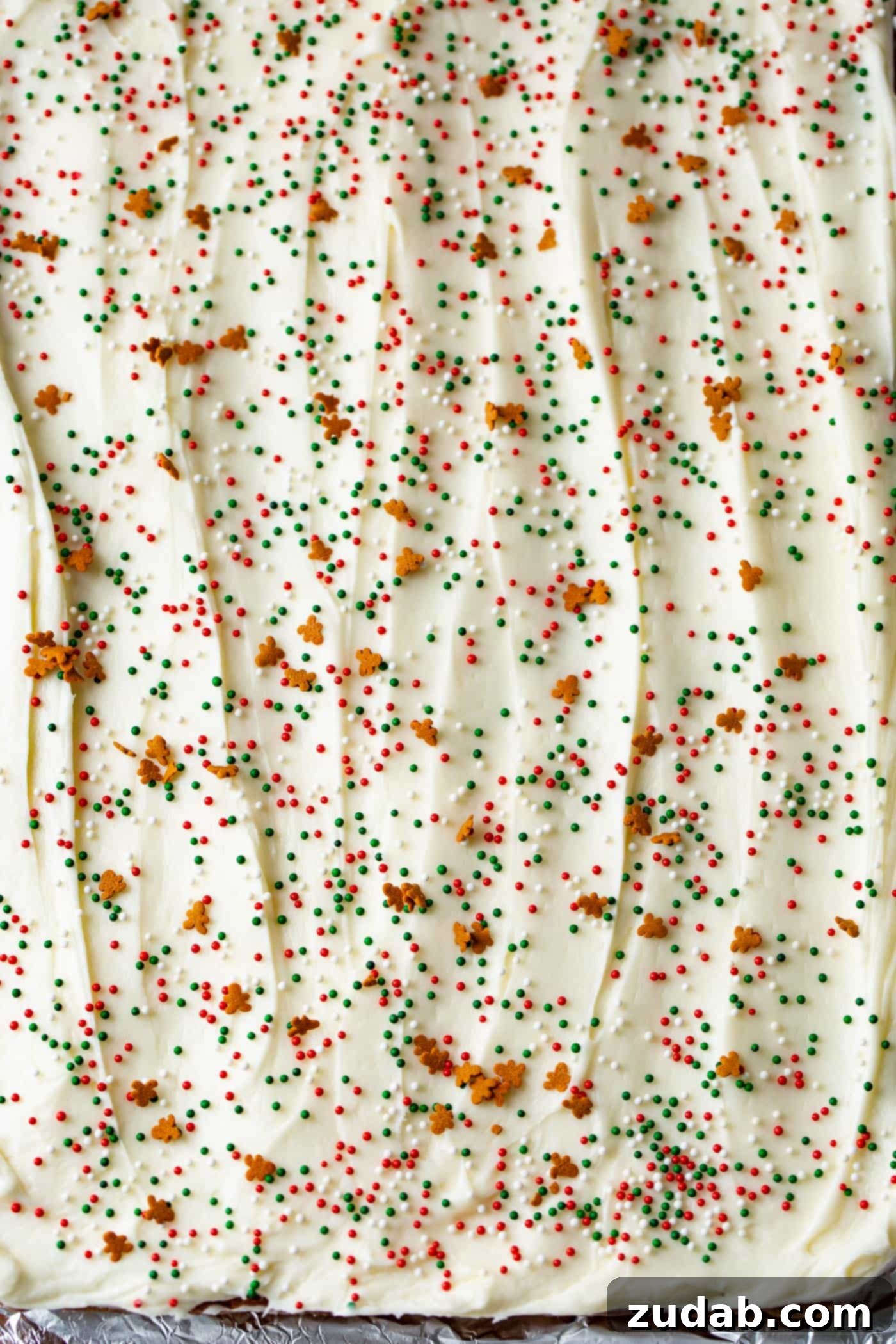 Gingerbread Bars with Cream Cheese Frosting A second view of a pan of generously frosted gingerbread bars, prior to being cut into individual servings, highlighting the inviting creamy layer.