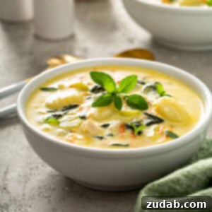 Olive Garden Chicken & Gnocchi Soup 2 A bowl of creamy Olive Garden style chicken gnocchi soup with fresh herbs.