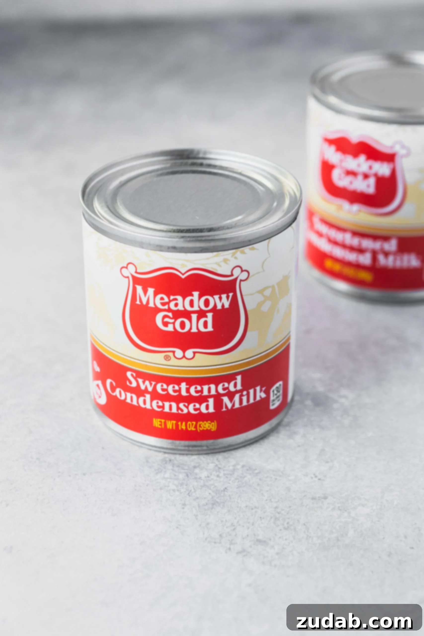 Homemade Dulce De Leche Recipe A simple yet elegant photo of a can of sweetened condensed milk, the key ingredient for homemade dulce de leche.