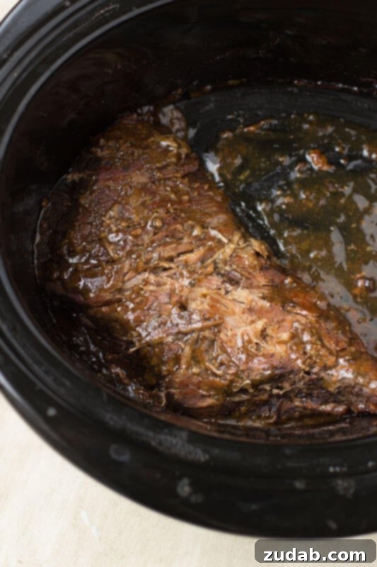 This pot roast sandwich is going to have husbands everywhere proposing all over again. Mark. My. Words. It's just that good. Pot Roast in a crock pot.