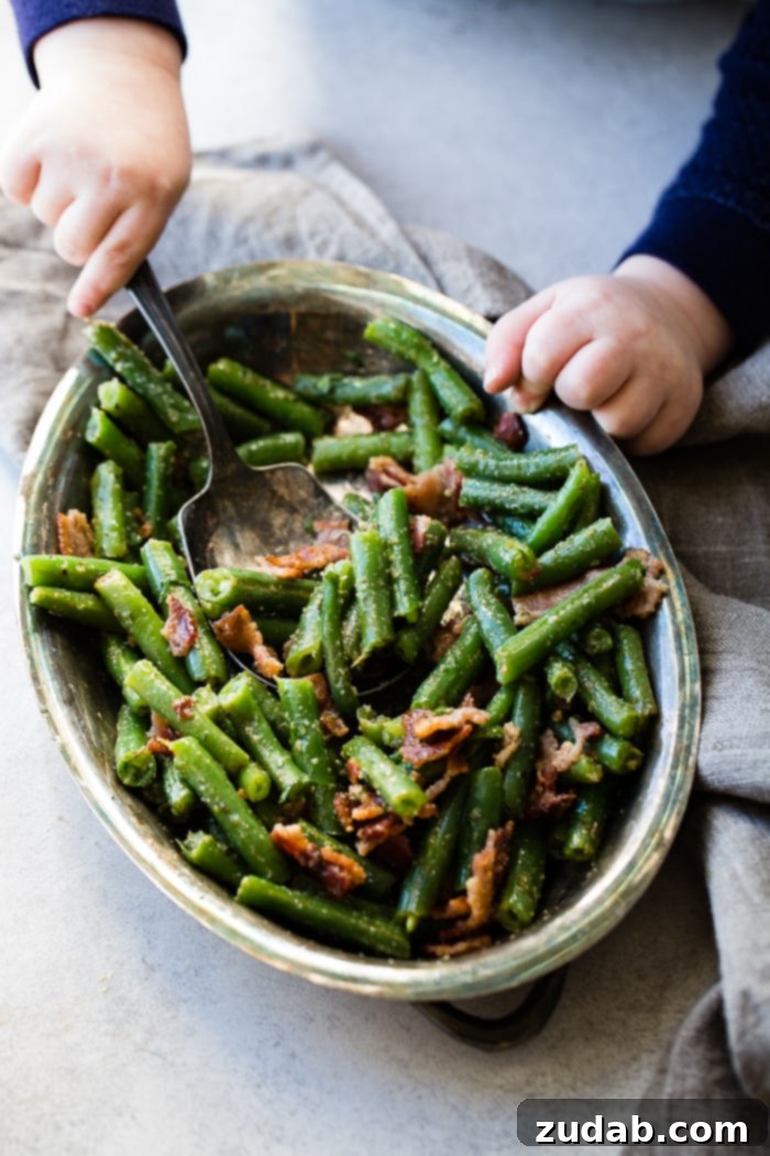 Bacon-kissed Green Beans 6 Little Boy Reaching for Green Beans with Bacon