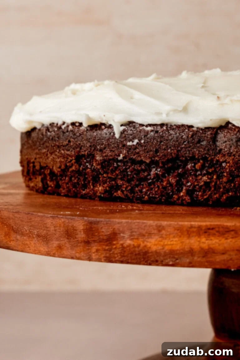 From Box to Bliss: Elevating Simple Chocolate Cake 16 Leveling the cake layers with a serrated knife.
