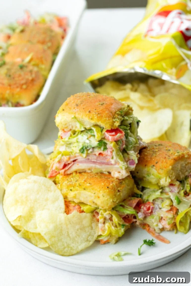 Super Bowl Slider Showdown: An Italian Twist 10 Italian sliders with chips.
