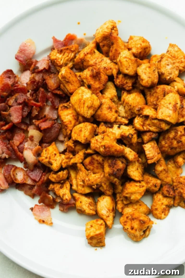Sheet Pan Chicken with Autumn Vegetables 5 Chicken and Bacon Cooking in Skillet