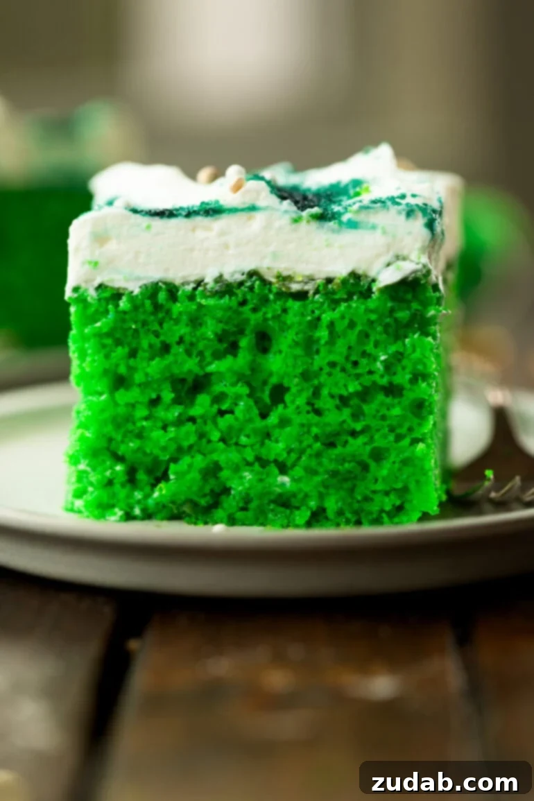 Luck o' the Irish Poke Cake 6 Fluffy Green Cake with White Frosting and Green Sprinkles