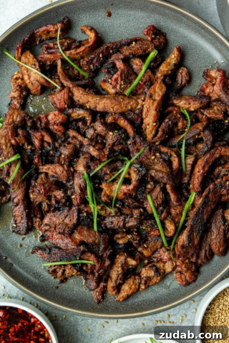 Effortless Bulgogi: A Korean BBQ Delight You Can Make At Home 2 Tender and delicious beef bulgogi on a serving plate